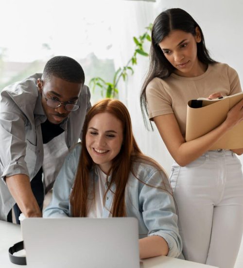 Consultants helping client in workspace