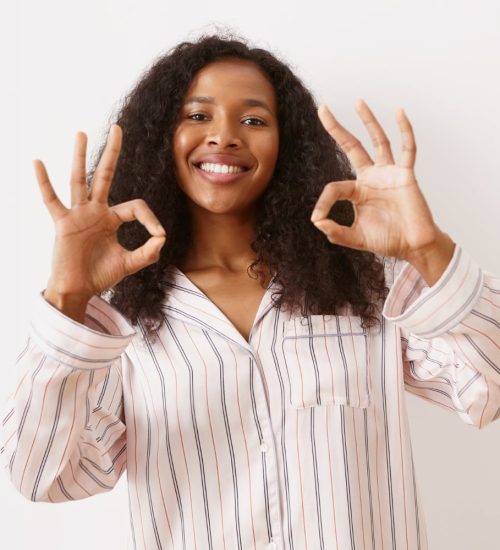 Happy Client showing ok gesture